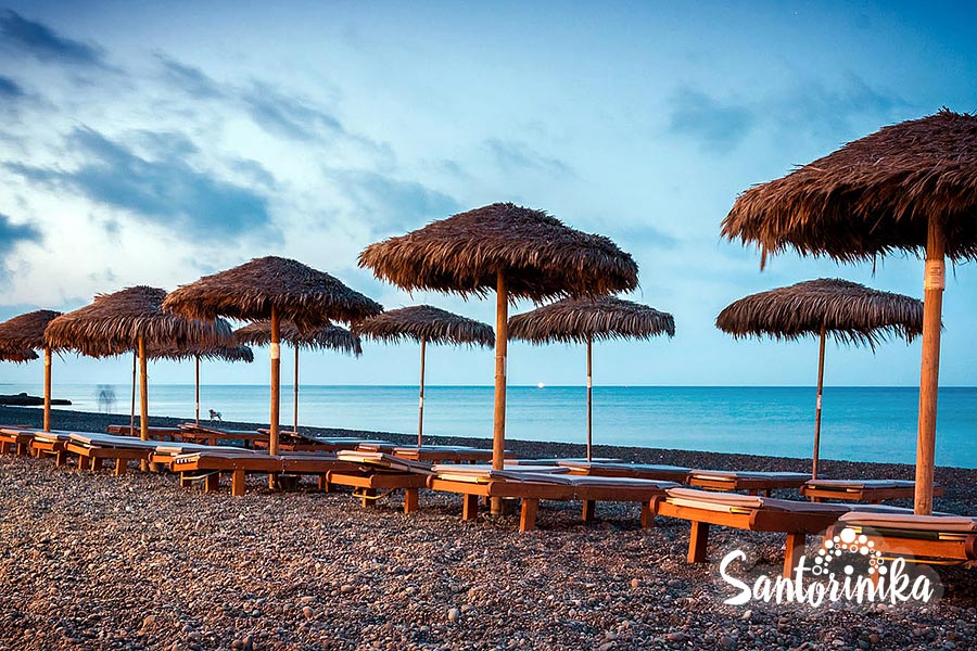 Kamari Black beach in the evening, Santorini, Greece