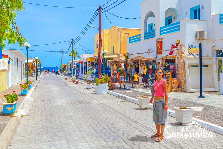 Going to the beach: one of the streets of Kamari, Santorini, Greece