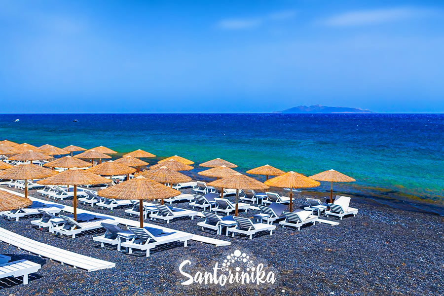 Black beach in Kamari village, Santorini, Greece