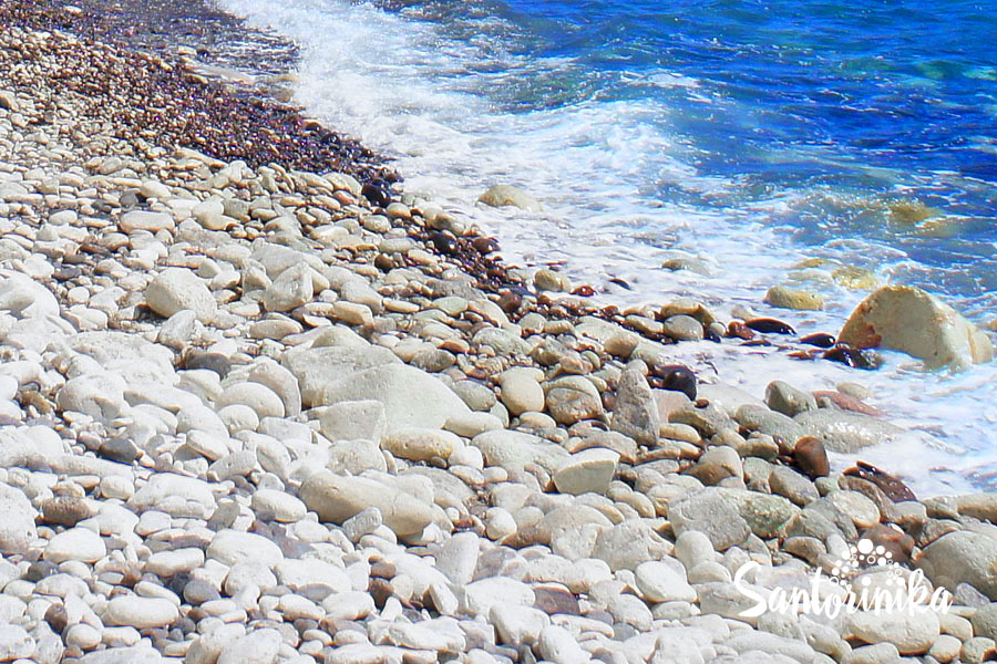 White pebbles on Aspri beach, Santorini, Greece