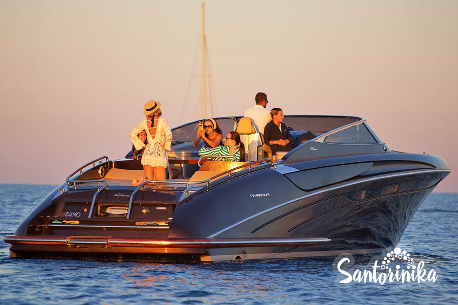 Watching the sunset in Santorini: motor yacht Riva Rivarama 44 in the caldera of the volcano